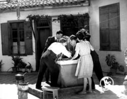 Scene from the social satire The Germans are returning, directed by Alekos Sakellarios