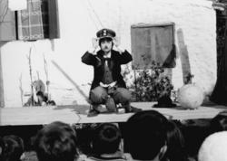 Aliki Vougiouklaki impersonating Charlie Chaplin in Takis Vougiouklakis' comedy Aliki the dictator